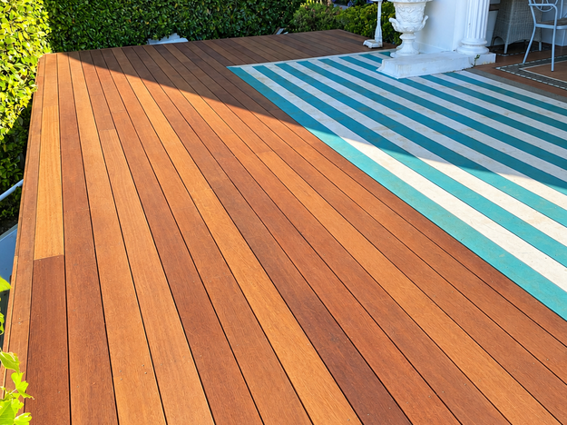 Kwila 140 x 19 mm deck extension and 2 x steps, Remuera , customer requested deck extension to existing blue and white decking and 2 sets of steps, customer planned to fit glass balustrades through seperate company after we finished 