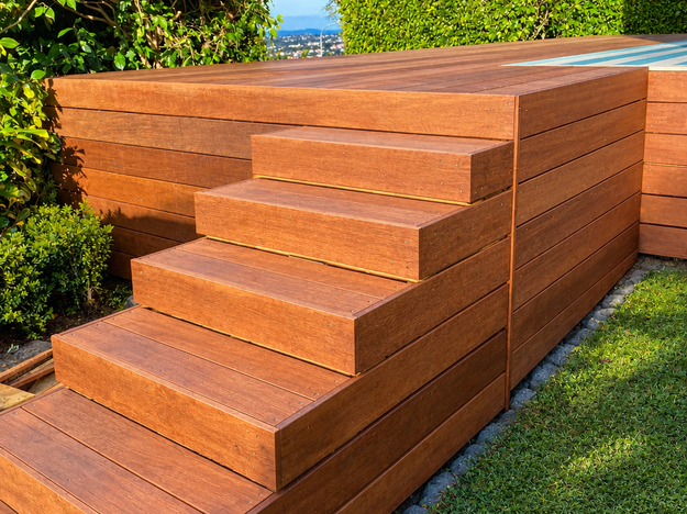 Kwila 140 x 19 mm deck extension and 2 x steps, Remuera , customer requested deck extension to existing blue and white decking and 2 sets of steps, customer planned to fit glass balustrades through seperate company after we finished 