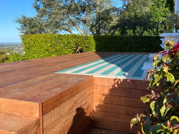 Kwila 140 x 19 mm deck extension and 2 x steps, Remuera , customer requested deck extension to existing blue and white decking and 2 sets of steps, customer planned to fit glass balustrades through seperate company after we finished 